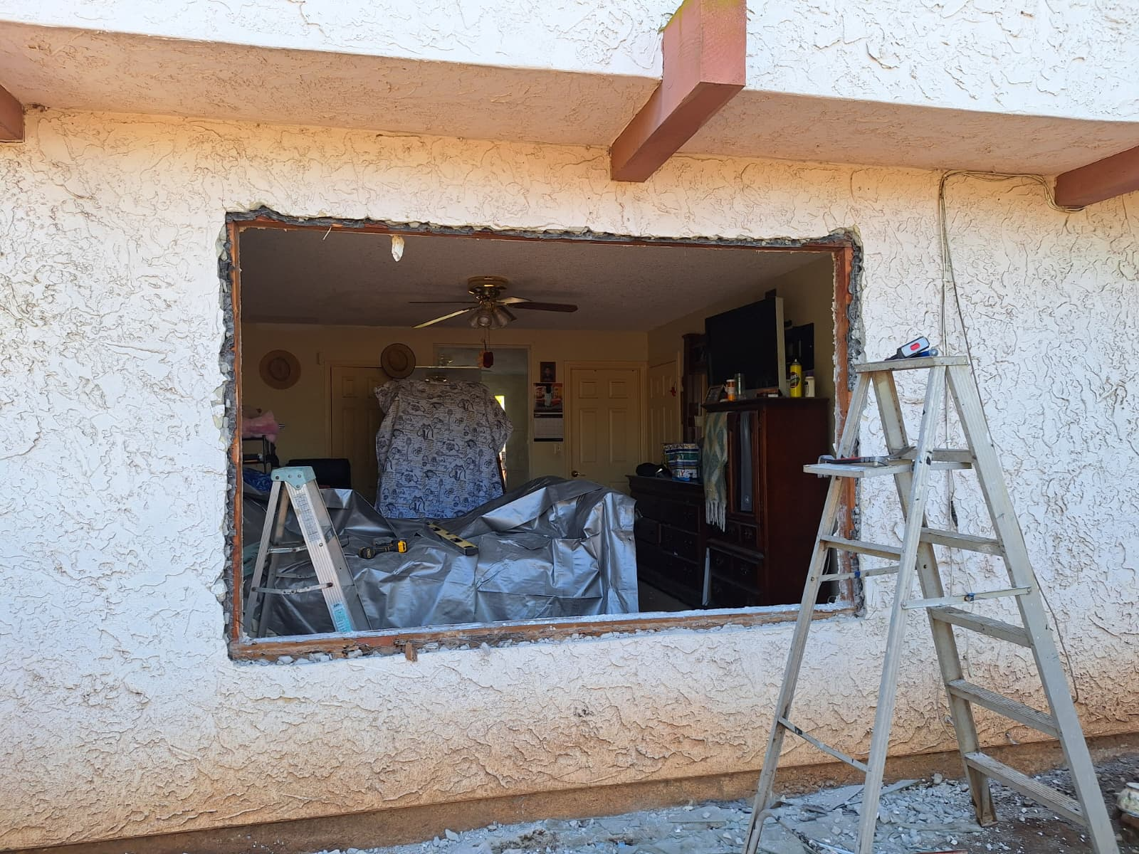 Exterior stucco wall with the window opening removed